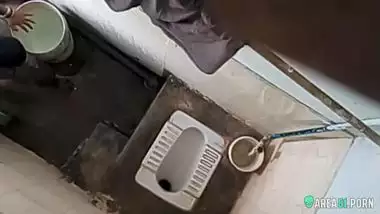 XXX clip of village aunty taking bath in outdoor taken on her son